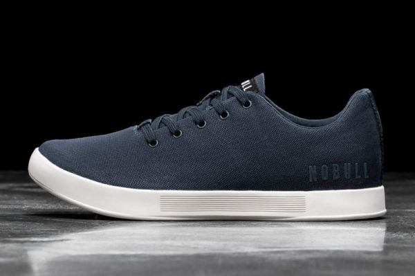 NOBULL WOMEN'S SHOES NAVY IVORY CANVAS TRAINER