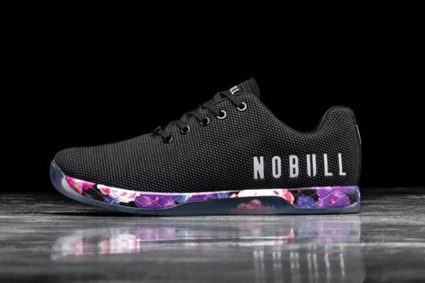 NOBULL WOMEN'S SHOES BLACK SPACE FLORAL TRAINER