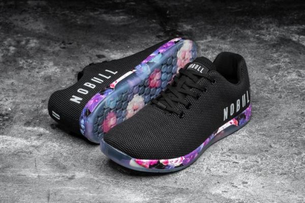 NOBULL WOMEN'S SHOES BLACK SPACE FLORAL TRAINER