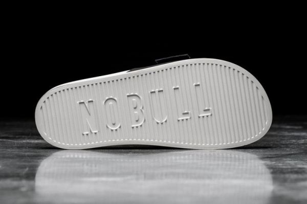 NOBULL WOMEN'S SHOES BLACK IVORY ADJUSTABLE SLIDE